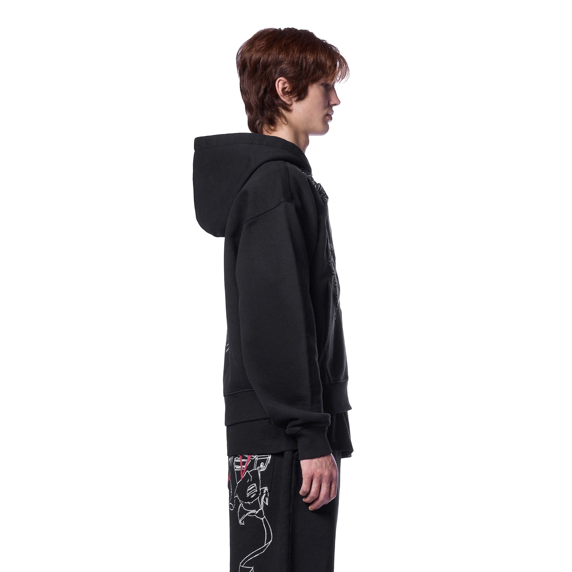 OFFCODE.USA black cotton zip-up hoodie with embroidered details on front and back. Model wearing size L.