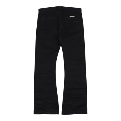 OFFCODE.USA black 100% cotton flare Richard cut chino pants with a subtle metal logo detail on the back pocket.