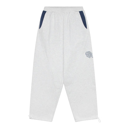 OFFCODE.USA Bigstep Joggers in light grey heather cotton blend with navy blue pocket accents and drawstring cuffs.