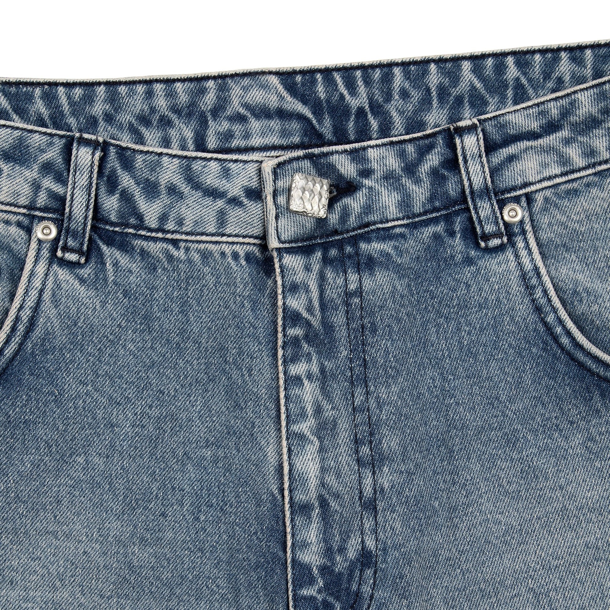 OFFCODE.USA gallery washed indigo denim jeans with custom button and debossed leather patch. 100% cotton.