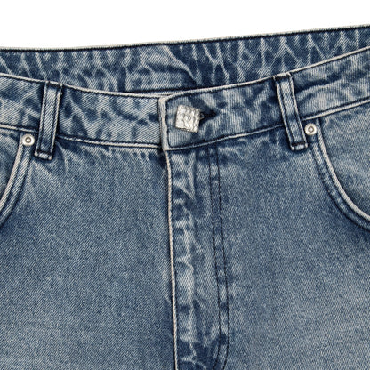 OFFCODE.USA gallery washed indigo denim jeans with custom button and debossed leather patch. 100% cotton.