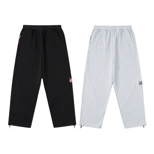 OFFCODE.USA MERTRA x Umbro black and grey warm-up joggers with zip cuffs and embroidered logos.